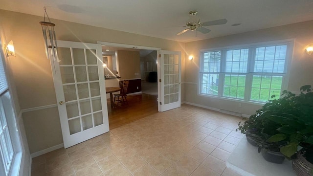 22 Weatherstone Dr, Appleton, WI 54914 - unfurnished room with french doors, ceiling fan, and light tile patterned flooring