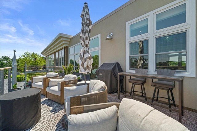 N52W35002 Lake Dr Unit 302, Okauchee, WI 53069 - view of patio / terrace featuring area for grilling and an outdoor hangout area