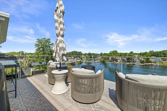N52W35002 Lake Dr Unit 302, Okauchee, WI 53069 - view of patio / terrace with a water view