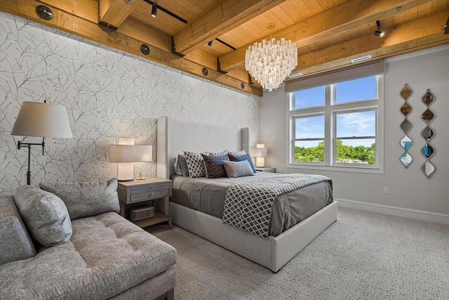 N52W35002 Lake Dr Unit 302, Okauchee, WI 53069 - carpeted bedroom featuring rail lighting, a wood ceiling with exposed beams, and a chandelier