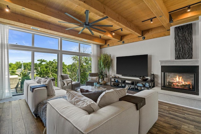N52W35002 Lake Dr Unit 302, Okauchee, WI 53069 - living room featuring rail lighting, a wooden ceiling with exposed beams, a ceiling fan, a glass covered fireplace, and hardwood / wood-style floors