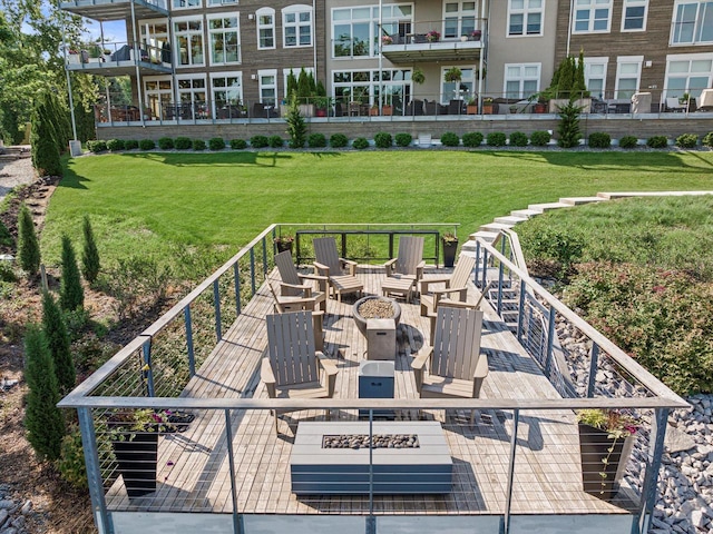 N52W35002 Lake Dr Unit 302, Okauchee, WI 53069 - view of community featuring an outdoor fire pit and a yard