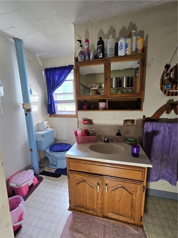 N35182 Weverstad Rd, Blair, WI 54616 - bathroom with tile patterned floors and vanity