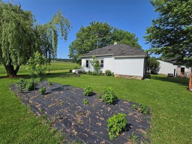 N35182 Weverstad Rd, Blair, WI 54616 - view of grassy yard featuring a patio area