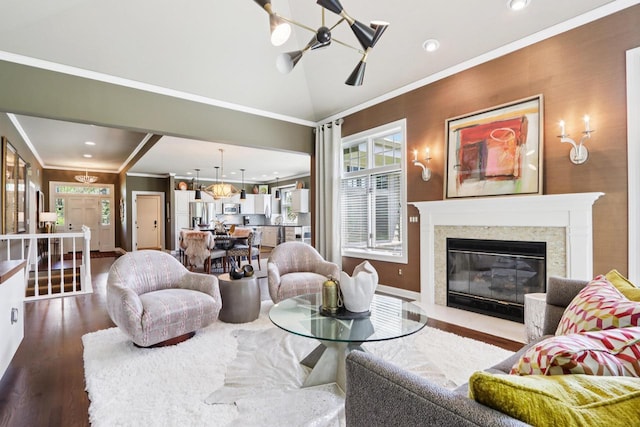 16885 Lake Rd Unit A, Brookfield, WI 53005 - living area with ornamental molding, dark wood-style flooring, recessed lighting, a chandelier, and a fireplace
