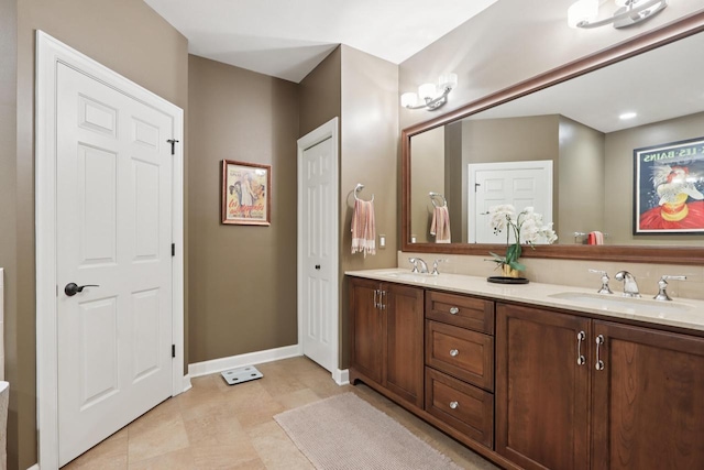 16885 Lake Rd Unit A, Brookfield, WI 53005 - full bath featuring double vanity and baseboards