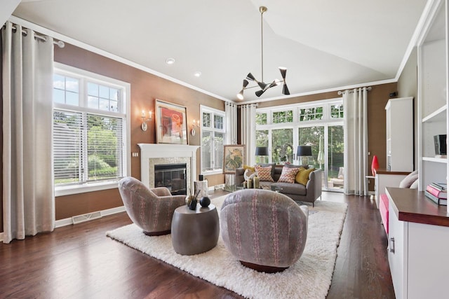 16885 Lake Rd Unit A, Brookfield, WI 53005 - living area with a glass covered fireplace, crown molding, dark wood-style flooring, vaulted ceiling, and recessed lighting
