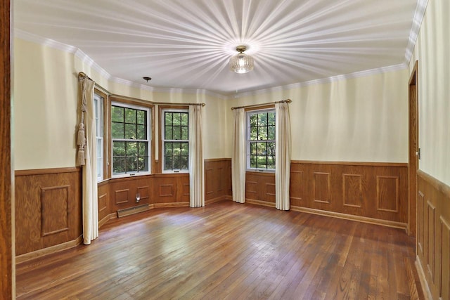 3023 Bruce Dr, Racine, WI 53404 - spare room with wainscoting, hardwood / wood-style floors, and ornamental molding