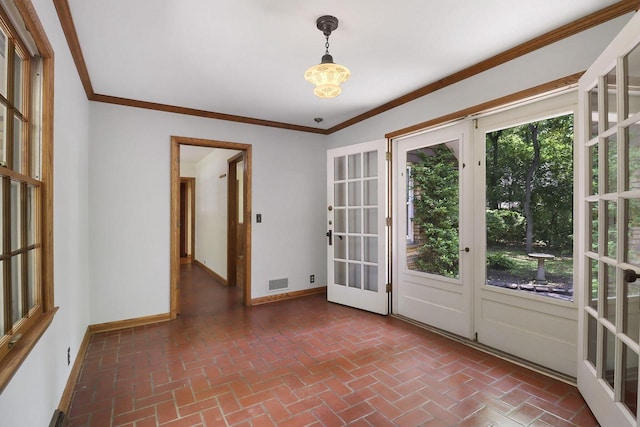 3023 Bruce Dr, Racine, WI 53404 - unfurnished room with crown molding and brick flooring