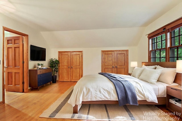 3023 Bruce Dr, Racine, WI 53404 - bedroom featuring vaulted ceiling and light wood finished floors