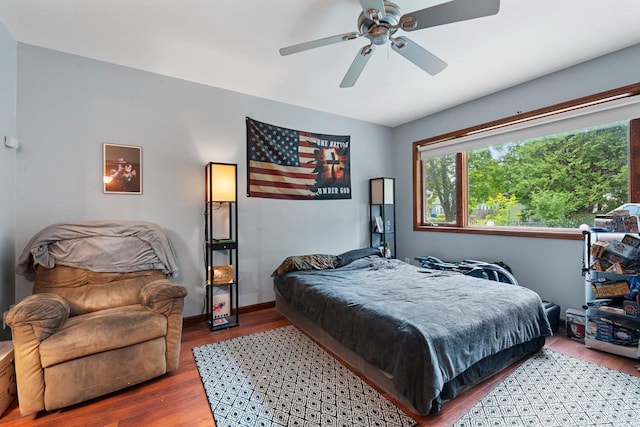 1418 W Washington St, Appleton, WI 54914 - bedroom with wood finished floors and a ceiling fan