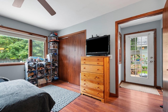 1418 W Washington St, Appleton, WI 54914 - bedroom featuring wood finished floors, a closet, and ceiling fan