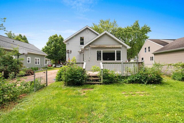 1418 W Washington St, Appleton, WI 54914 - rear view of house featuring a wooden deck