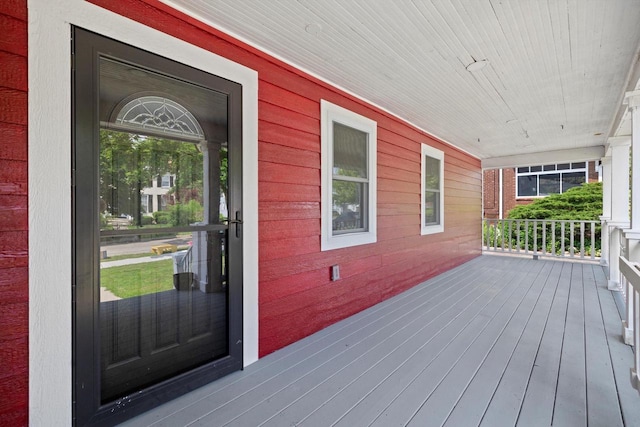 513 61st St, Kenosha, WI 53143 - view of wooden porch