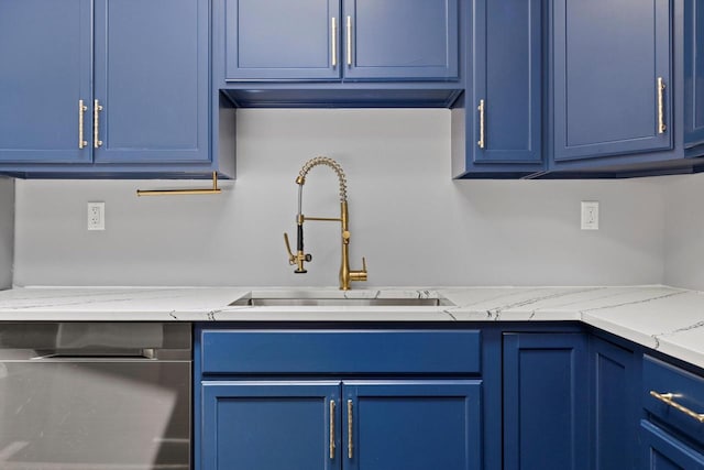 513 61st St, Kenosha, WI 53143 - kitchen featuring blue cabinets, dishwasher, and light stone countertops