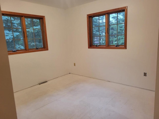 1607 E Cleveland St, Marshfield, WI 54449 - empty room featuring concrete floors