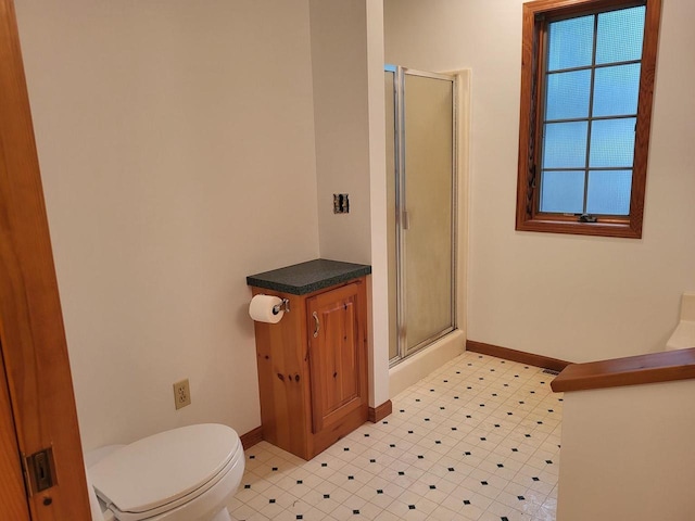 1607 E Cleveland St, Marshfield, WI 54449 - bathroom with a shower with shower door and tile patterned floors