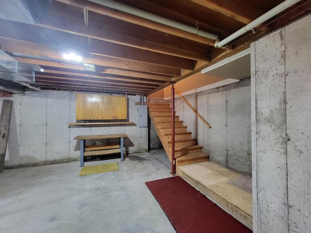 1607 E Cleveland St, Marshfield, WI 54449 - unfinished basement with stairs and electric panel