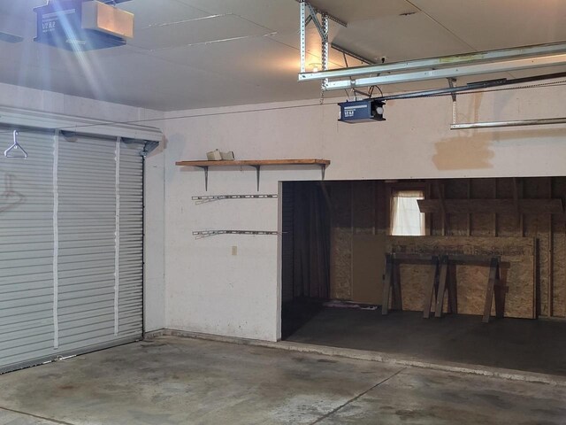 1607 E Cleveland St, Marshfield, WI 54449 - garage featuring a garage door opener