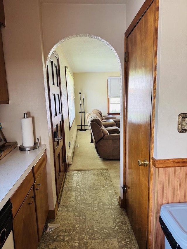 1117 21st St, Monroe, WI 53566 - corridor with arched walkways and tile patterned floors