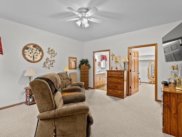 4821 W Custer St, Manitowoc, WI 54220 - carpeted living room with a ceiling fan and baseboards