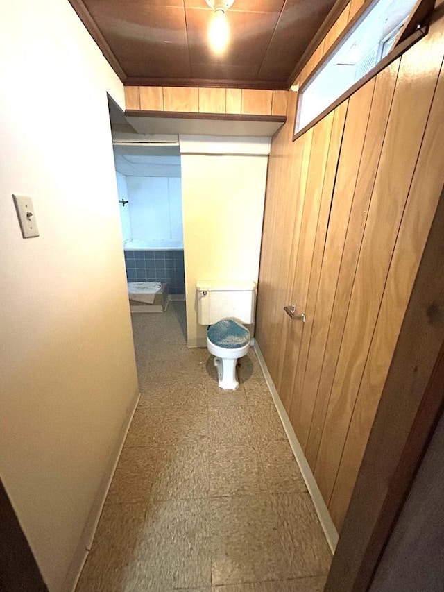 4228 N 52nd St, Milwaukee, WI 53216 - bathroom with wooden walls and tile patterned floors