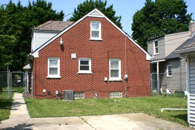 4228 N 52nd St, Milwaukee, WI 53216 - view of home's exterior featuring brick siding and a gate