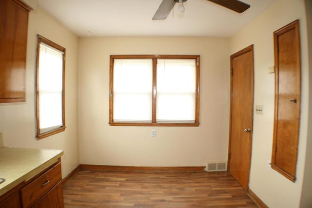 4228 N 52nd St, Milwaukee, WI 53216 - unfurnished dining area with ceiling fan, healthy amount of natural light, and wood finished floors