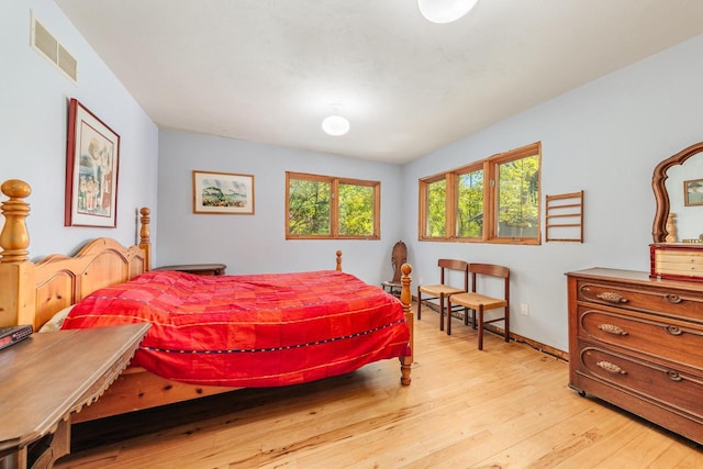 W296N2978 Franciscan Rd, Pewaukee, WI 53072 - bedroom with light wood-style flooring