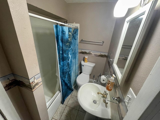 1116 Liberty Ave, Beloit, WI 53511 - full bath featuring tile patterned flooring and a shower stall