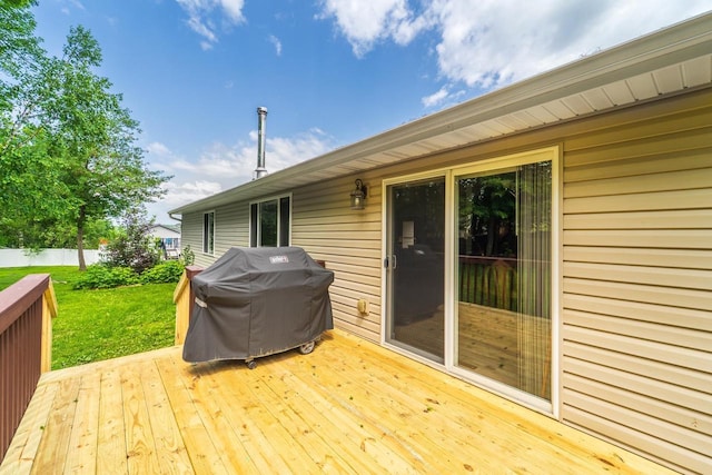 6615 Cavin Dr, Wausau, WI 54401 - wooden deck featuring a grill