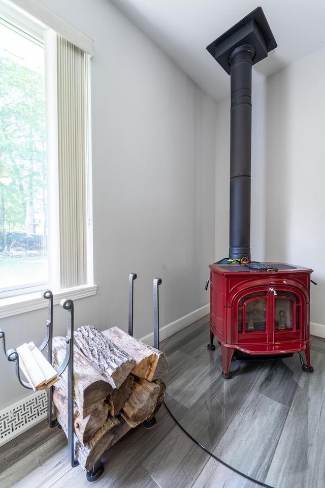 6615 Cavin Dr, Wausau, WI 54401 - detailed view of wood finished floors and a wood stove