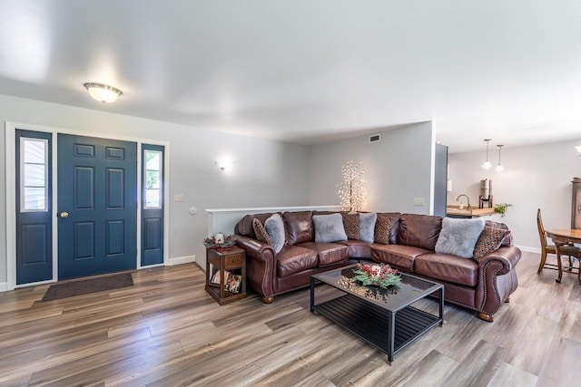 6615 Cavin Dr, Wausau, WI 54401 - living room with wood finished floors and baseboards