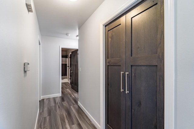 6615 Cavin Dr, Wausau, WI 54401 - corridor with dark wood-style flooring and baseboards
