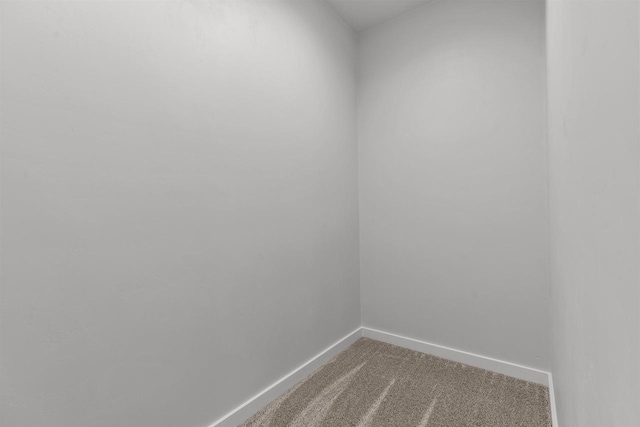 3453 Veanna Blvd, Oshkosh, WI 54904 - unfurnished room featuring baseboards and carpet floors