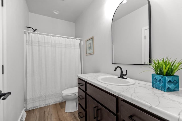 3453 Veanna Blvd, Oshkosh, WI 54904 - full bathroom with vanity and wood finished floors
