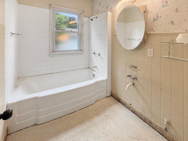 4958 S 20th St, Milwaukee, WI 53221 - bathroom featuring wainscoting, wallpapered walls, tile walls, and bathtub / shower combination