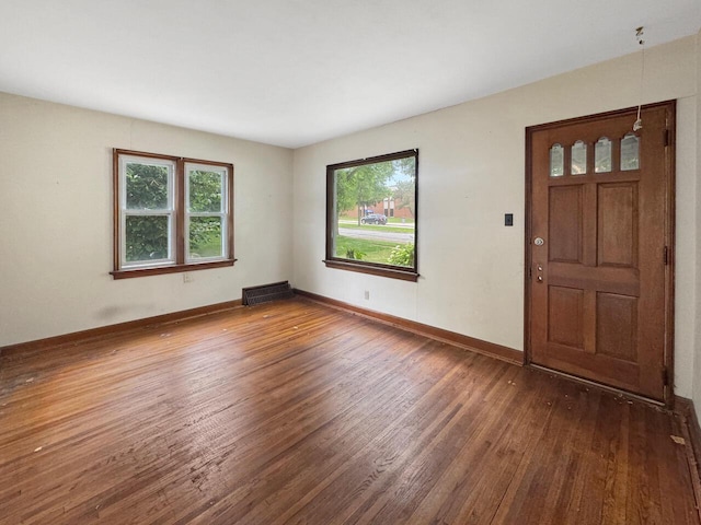 4958 S 20th St, Milwaukee, WI 53221 - foyer entrance featuring wood finished floors and baseboards