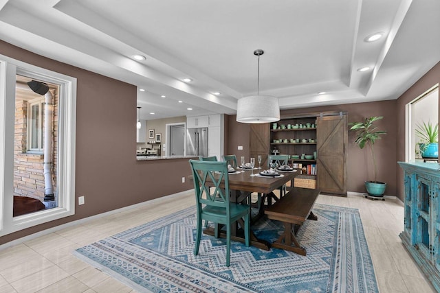 1824 W Reid Dr, Appleton, WI 54914 - dining room featuring a tray ceiling, recessed lighting, and light tile patterned floors