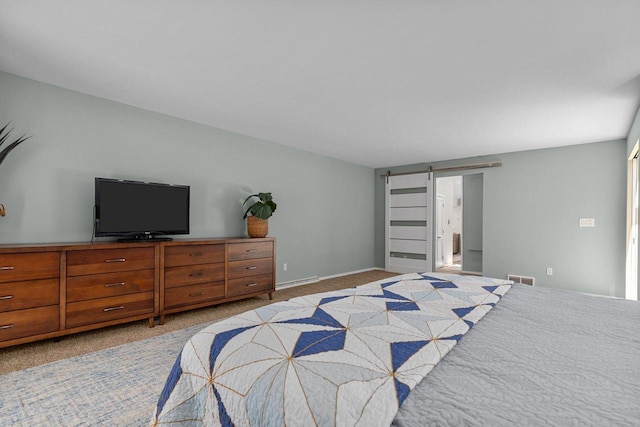 1824 W Reid Dr, Appleton, WI 54914 - bedroom featuring light colored carpet and a barn door