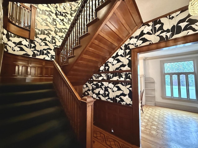 195 E Park Ave, Berlin, WI 54923 - stairway with vaulted ceiling and wallpapered walls