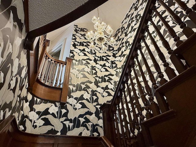 195 E Park Ave, Berlin, WI 54923 - stairway with wallpapered walls and a chandelier
