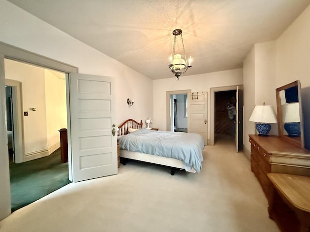 195 E Park Ave, Berlin, WI 54923 - bedroom with carpet, a chandelier, and a spacious closet
