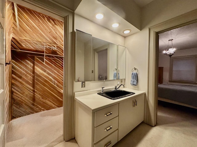 195 E Park Ave, Berlin, WI 54923 - bathroom with vanity, a chandelier, and recessed lighting