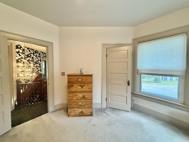 195 E Park Ave, Berlin, WI 54923 - bedroom with a chandelier and carpet