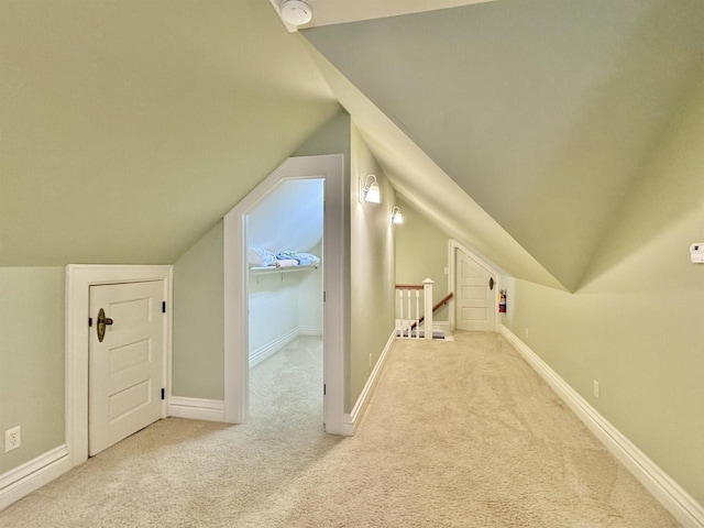 195 E Park Ave, Berlin, WI 54923 - additional living space featuring carpet floors and vaulted ceiling