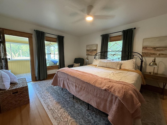 2505 Robinsdale Ave, La Crosse, WI 54601 - bedroom featuring multiple windows, wood finished floors, and a ceiling fan