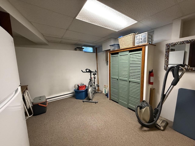 2505 Robinsdale Ave, La Crosse, WI 54601 - exercise room with a baseboard heating unit, a drop ceiling, and carpet floors