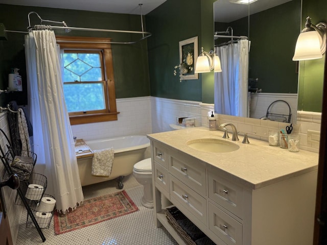 2505 Robinsdale Ave, La Crosse, WI 54601 - full bath with a wainscoted wall, vanity, a tub to relax in, a shower with shower curtain, and tile patterned flooring