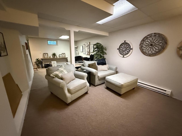 2505 Robinsdale Ave, La Crosse, WI 54601 - living area with a baseboard heating unit, carpet, and a desk